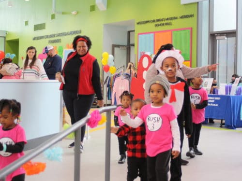 Guests enter the MIssissippi Children's Museum - Meridian for Dr. Seuss' Silly Birthday Celebration