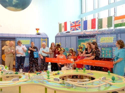 Missi the Traveler Train Car Exhibit Ribbon Cutting