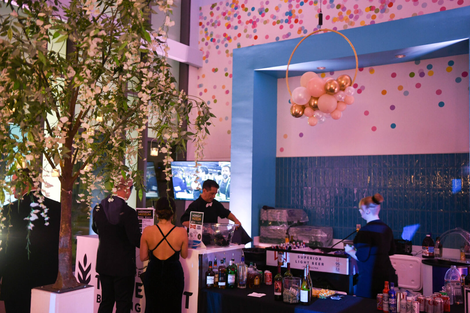 People standing at a bar